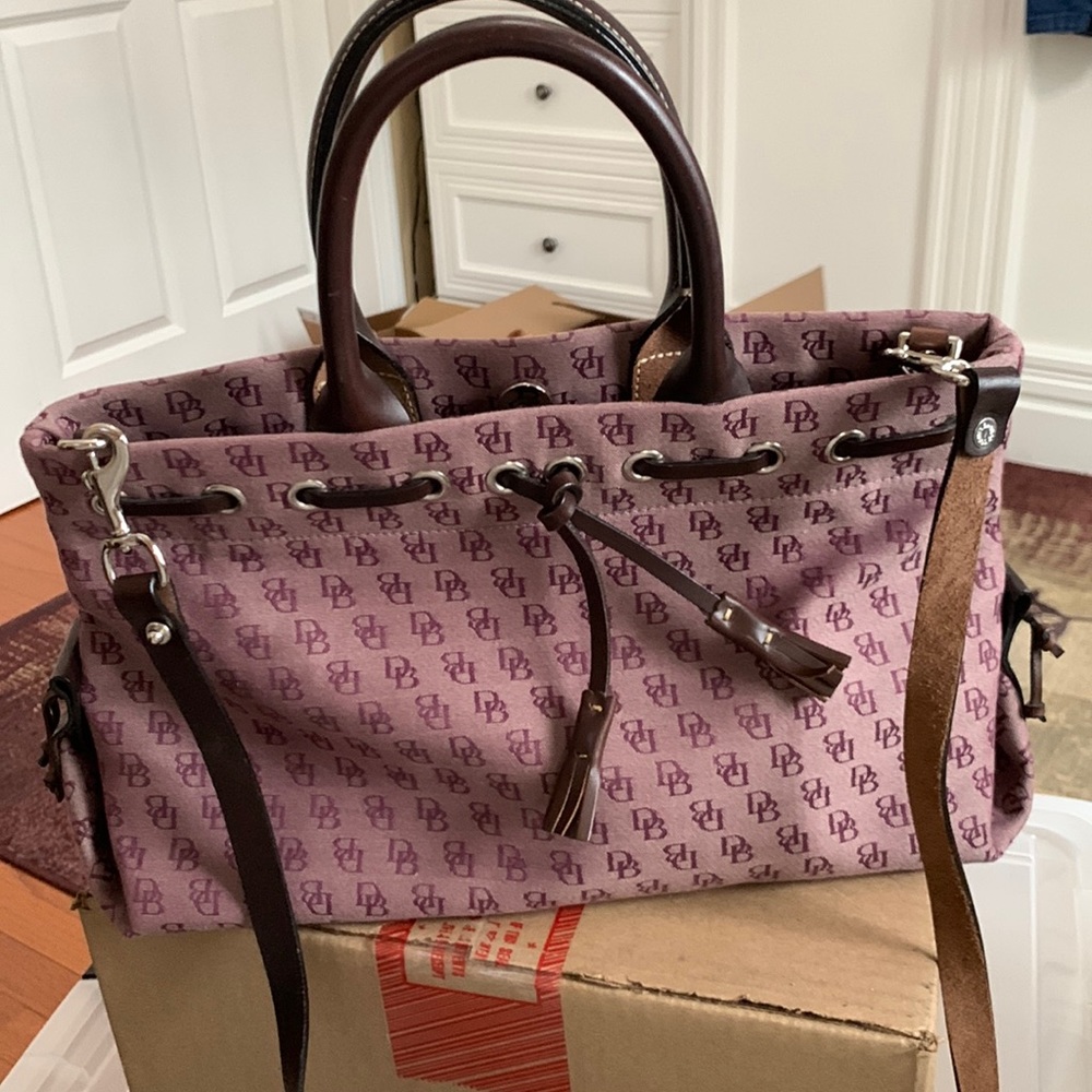 Dooney& Bourke monogram wine satchel with shoulder strap. Never carried